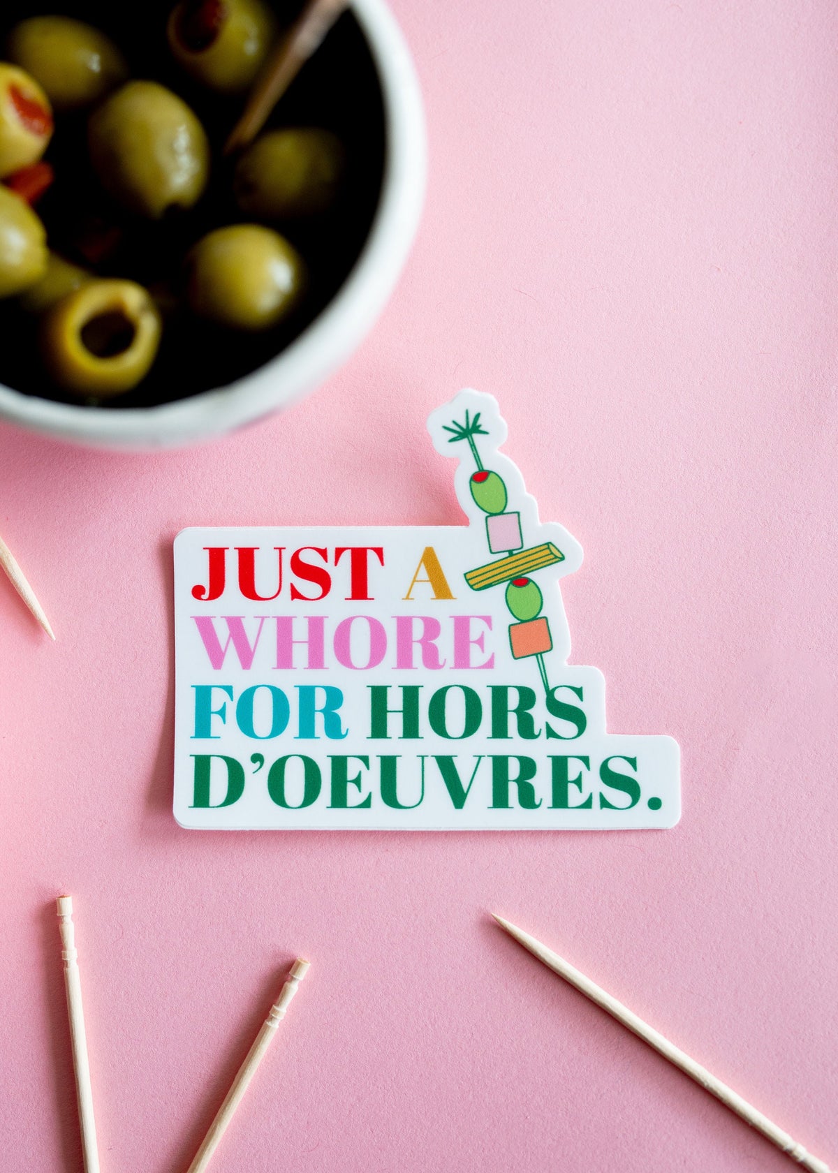 A silly sticker on a pink background.