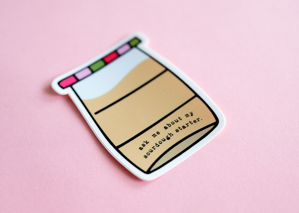 A vinyl sticker that looks like a jar of sourdough starter.
