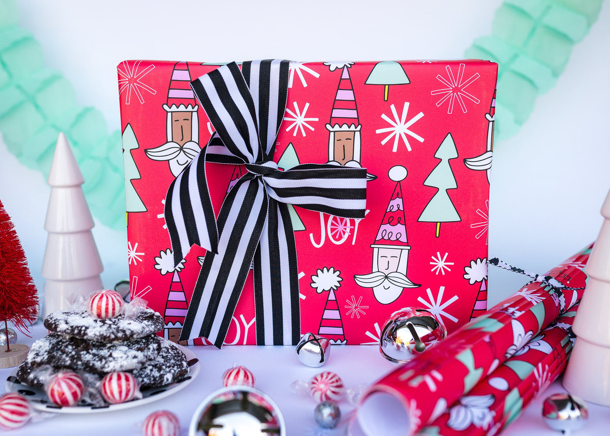 A holiday gift wrapped in a whimsical display.