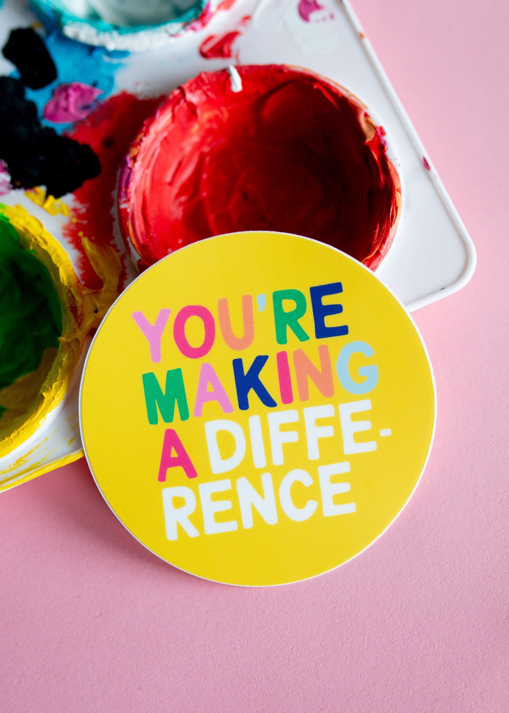 Bright and colorful vinyl sticker.